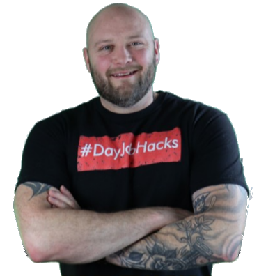 A bald man with tattoos and a t - shirt that says dayjik hacks.